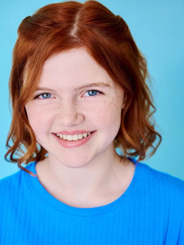 Headshot of a young performer represented by Level Talent Group