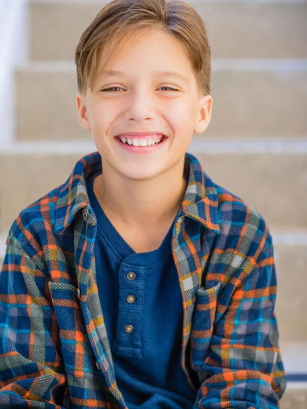 Headshot of a young performer represented by Level Talent Group