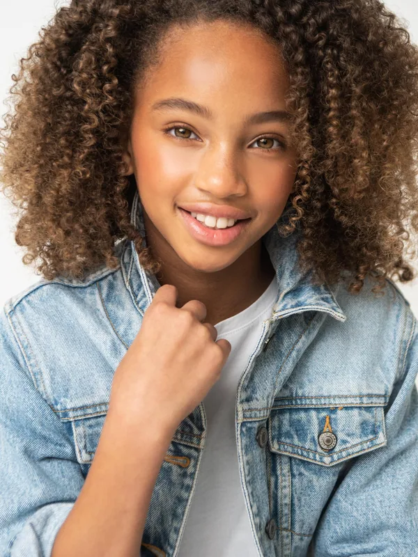 Headshot of a young performer represented by Level Talent Group