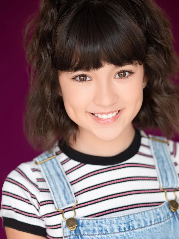 Headshot of a young performer represented by Level Talent Group