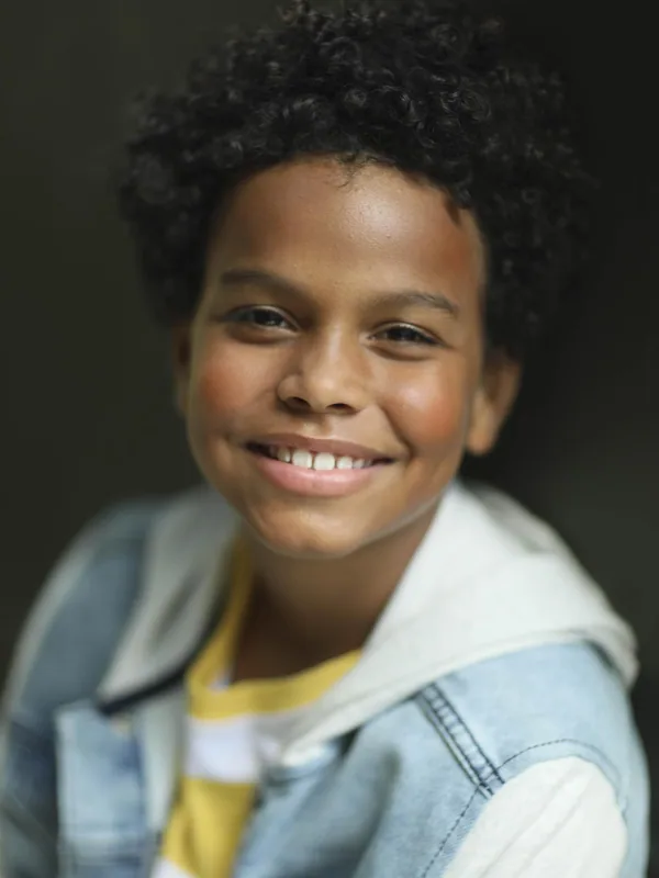 Headshot of a young performer represented by Level Talent Group