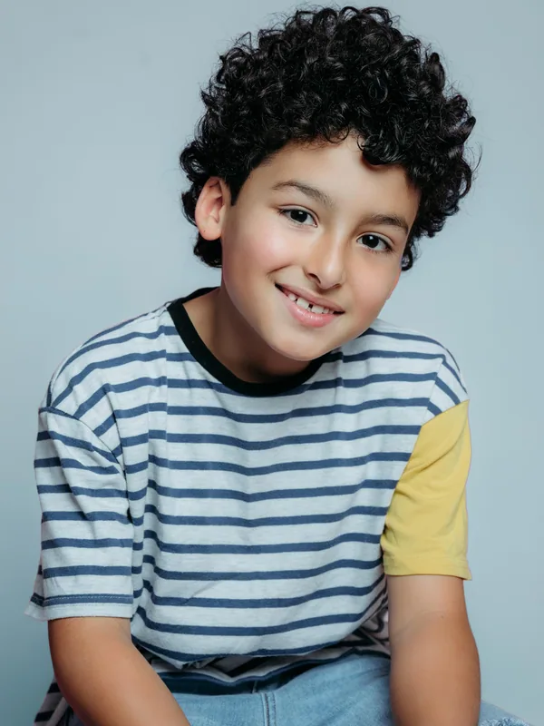 Headshot of a young performer represented by Level Talent Group
