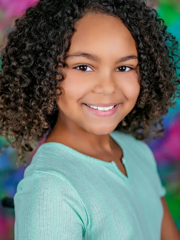 Headshot of a young performer represented by Level Talent Group
