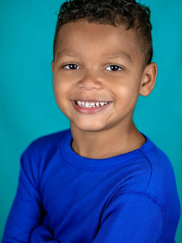 Headshot of a young performer represented by Level Talent Group