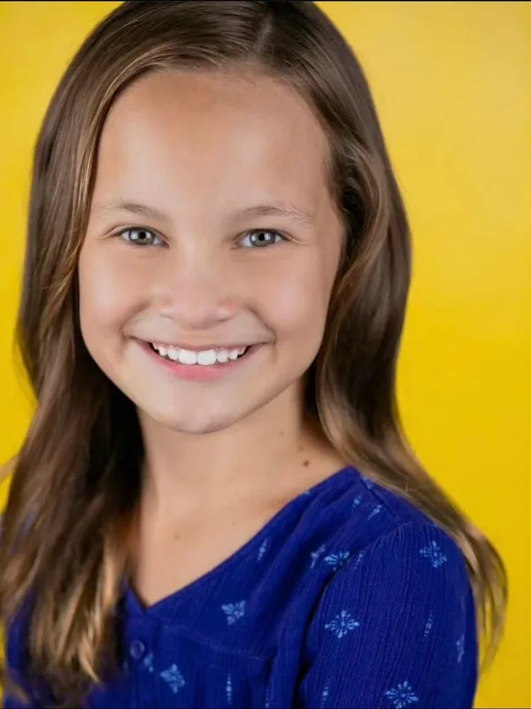 Headshot of a young performer represented by Level Talent Group
