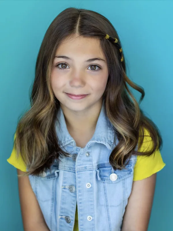 Headshot of a young performer represented by Level Talent Group