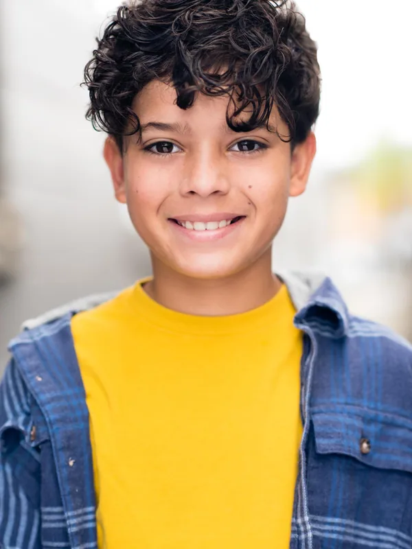 Headshot of a young performer represented by Level Talent Group