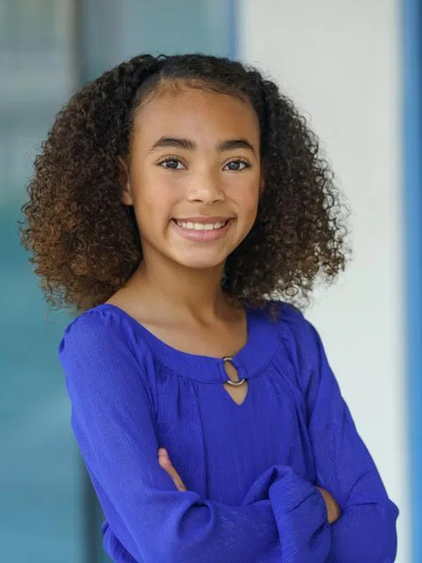Headshot of a young performer represented by Level Talent Group