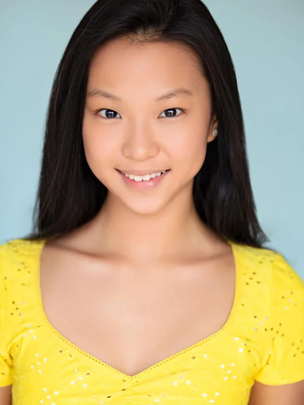 Headshot of a young performer represented by Level Talent Group