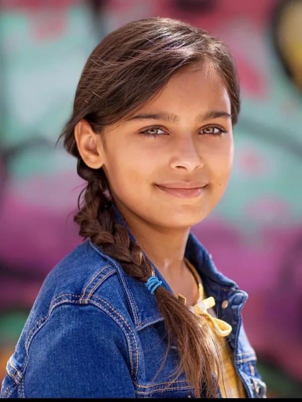 Headshot of a young performer represented by Level Talent Group