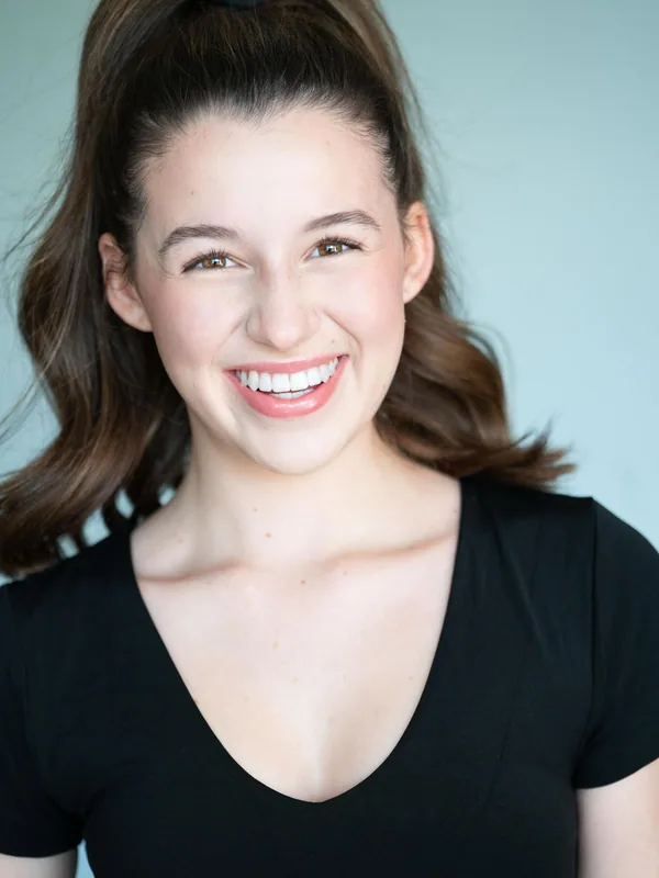 Headshot of a young performer represented by Level Talent Group