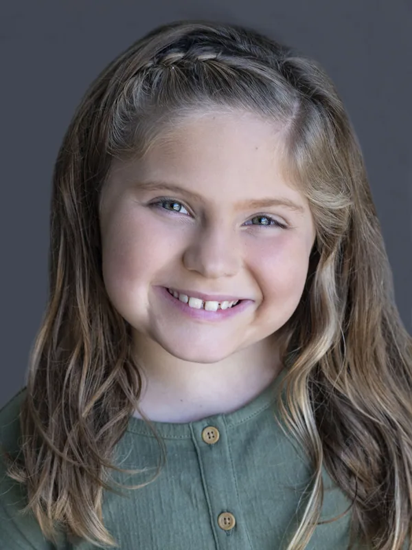 Headshot of a young performer represented by Level Talent Group