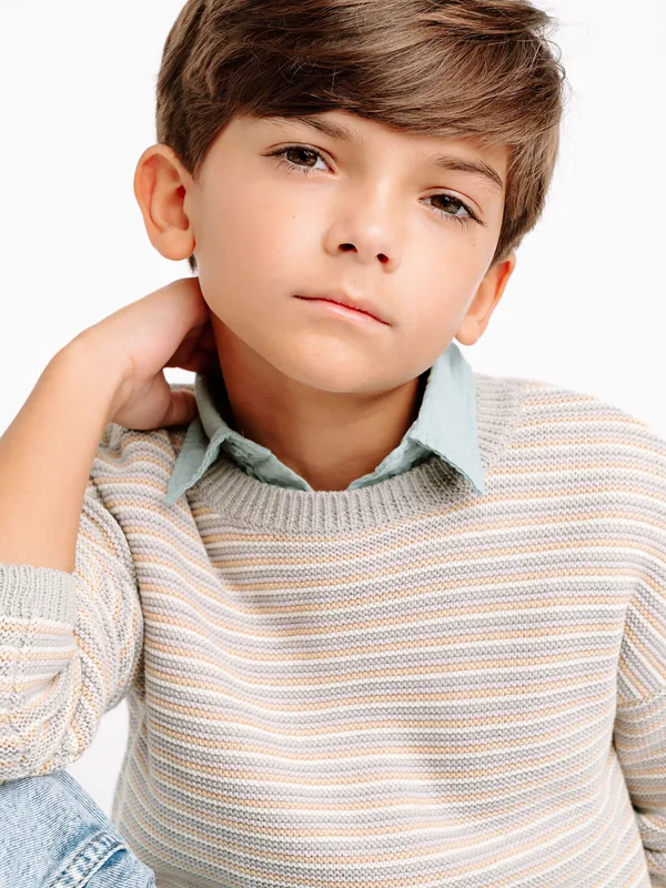 Headshot of a young performer represented by Level Talent Group