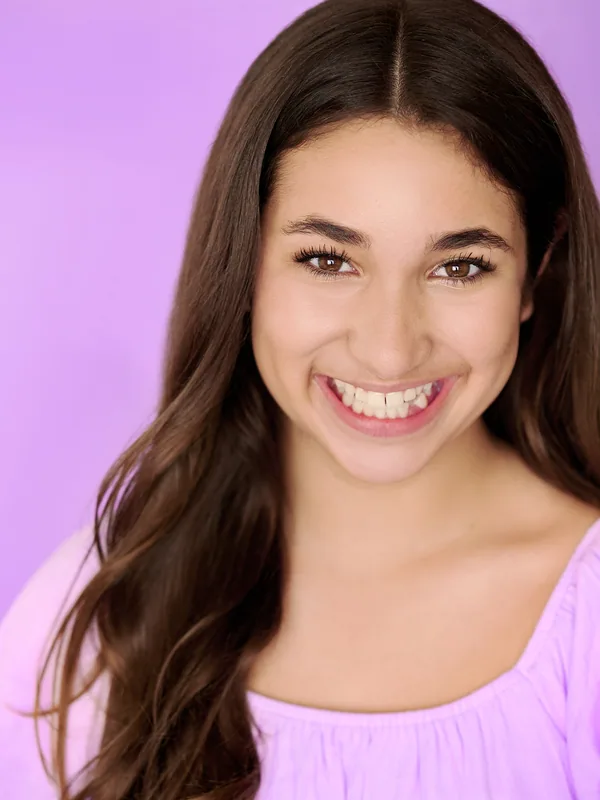 Headshot of a young performer represented by Level Talent Group