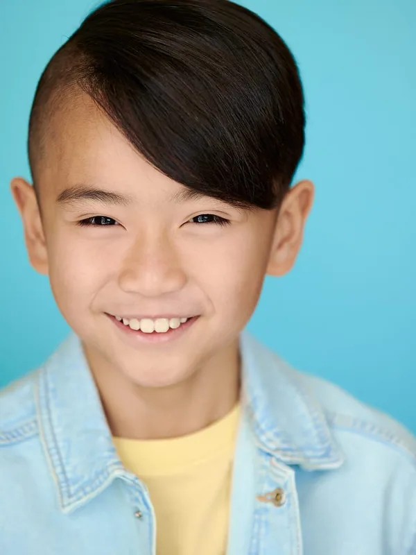 Headshot of a young performer represented by Level Talent Group