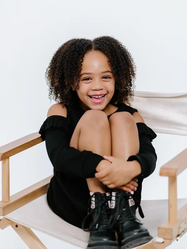 Headshot of a young performer represented by Level Talent Group