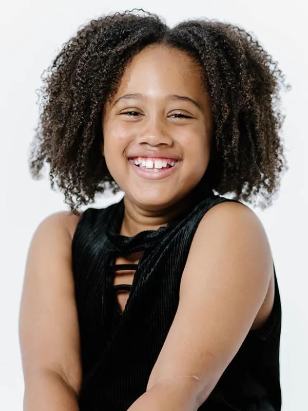 Headshot of a young performer represented by Level Talent Group