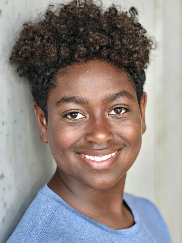 Headshot of a young performer represented by Level Talent Group