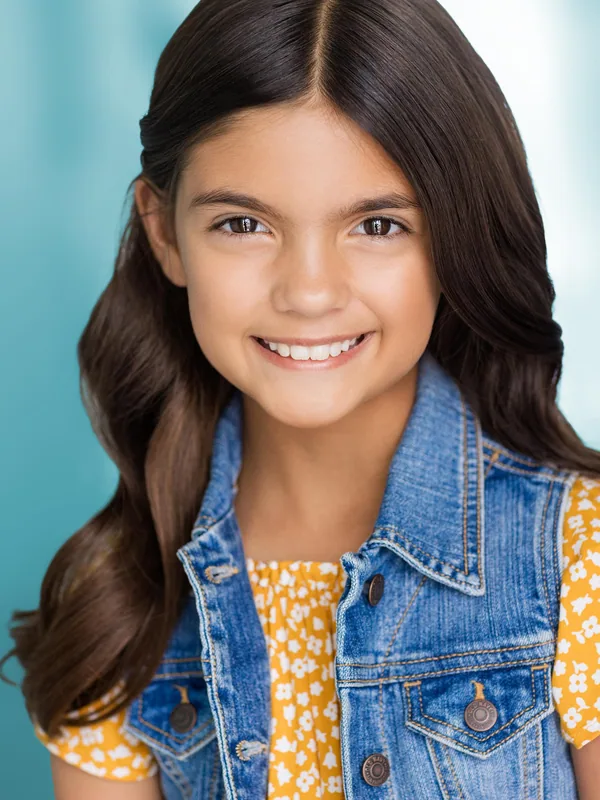 Headshot of a young performer represented by Level Talent Group