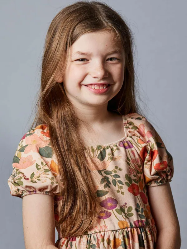 Headshot of a young performer represented by Level Talent Group