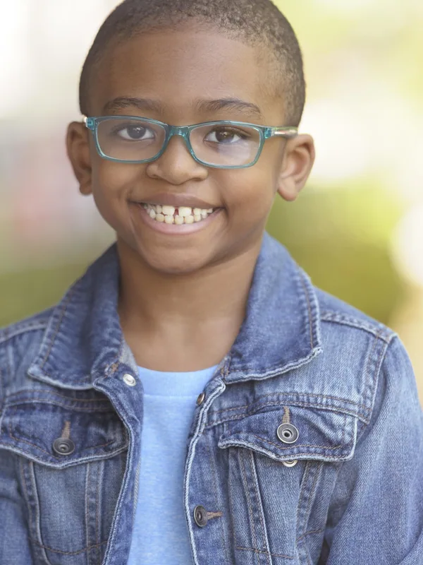 Headshot of a young performer represented by Level Talent Group
