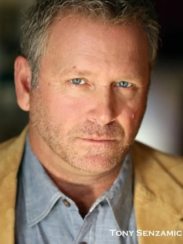 Headshot of an actor represented by Level Talent Group