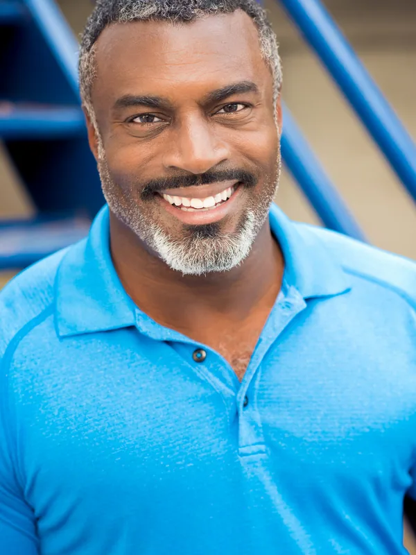 Headshot of an actor represented by Level Talent Group