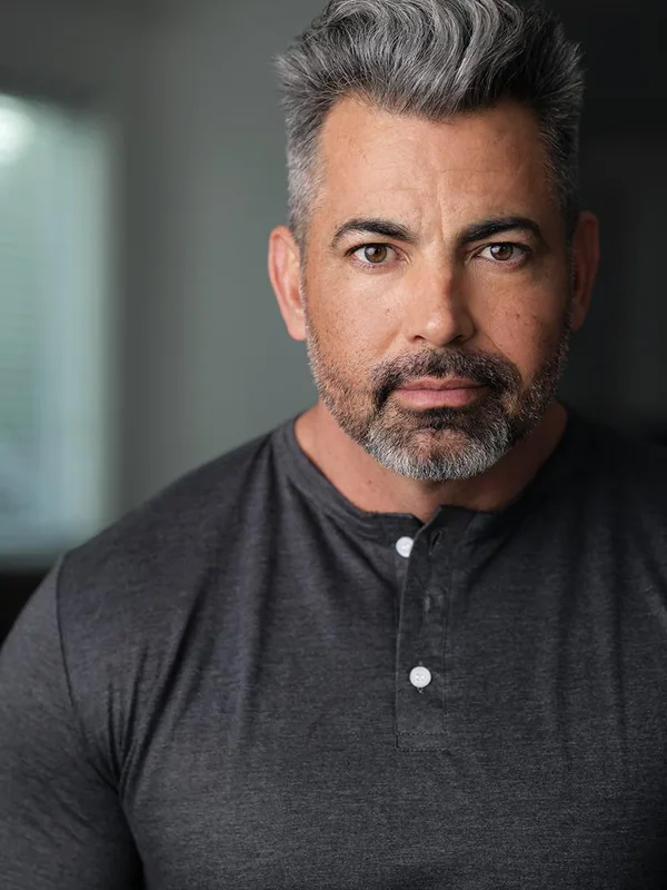 Headshot of an actor represented by Level Talent Group