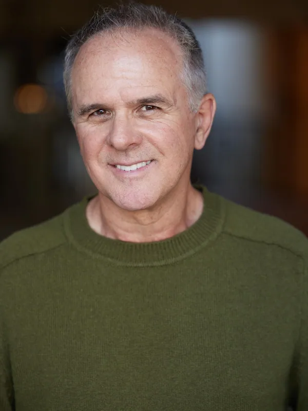 Headshot of an actor represented by Level Talent Group